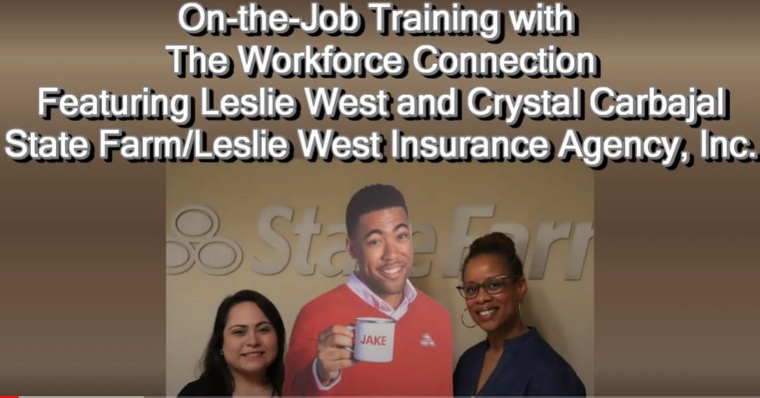 Photo to introduce a video about On-The-Job Training program at Leslie West Insurance Agency. Photo features 2 smiling women standing with a cardboard cutout of Jake from the State Farm commercials.